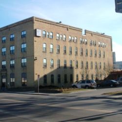 The Glenwood is now owned by Catholic Charities, the conversion of a warehouse to 80 unit housing. The Glenwood